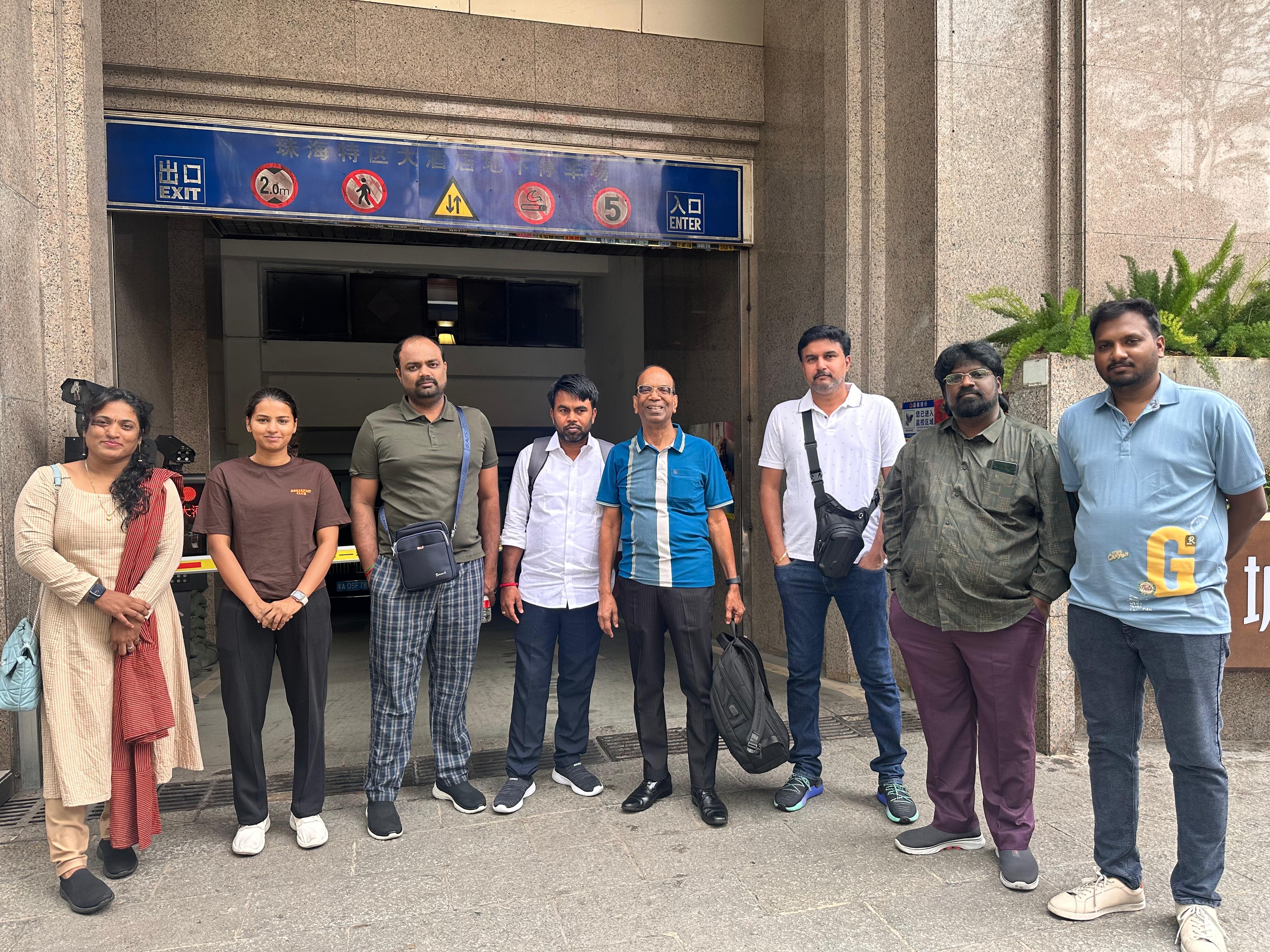SourcersBiz group outside a commercial building in China